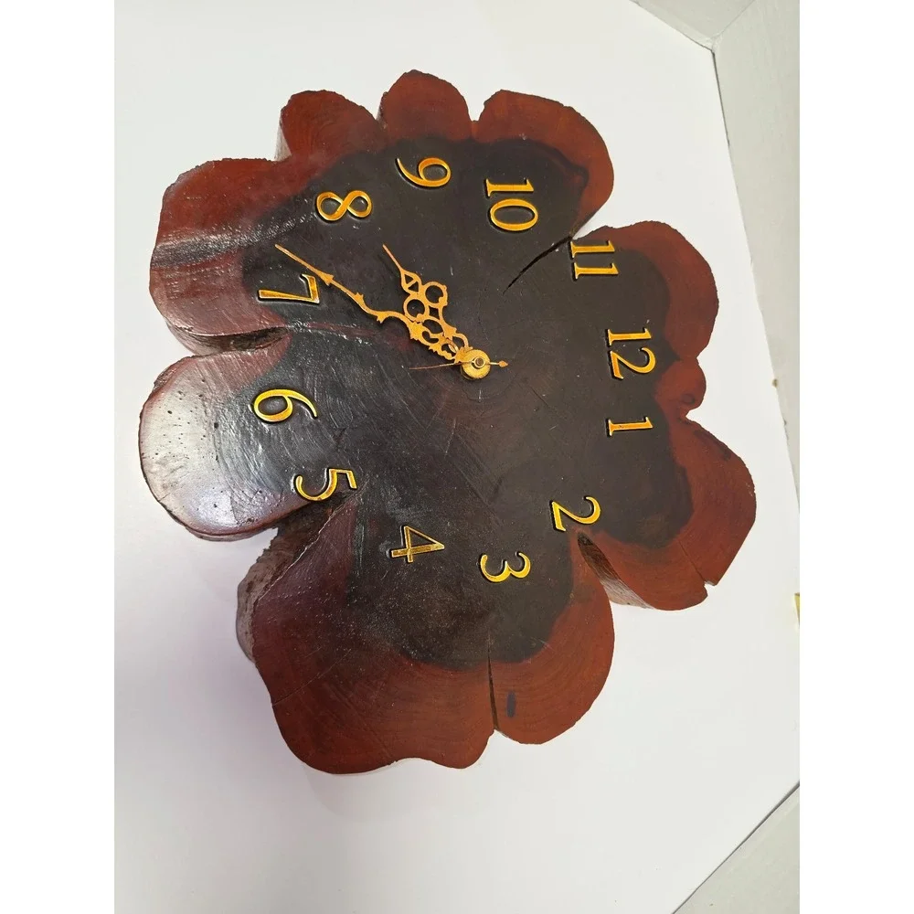 vintage live-edge wall clock is crafted from a natural wood tree slice,
